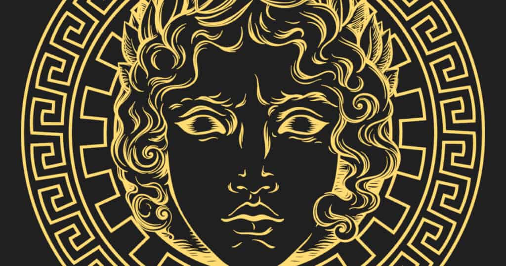 Karna Mahabharata guide - Featured Image - Picture of a curly haired man's face, angry eyes. Representing Karna